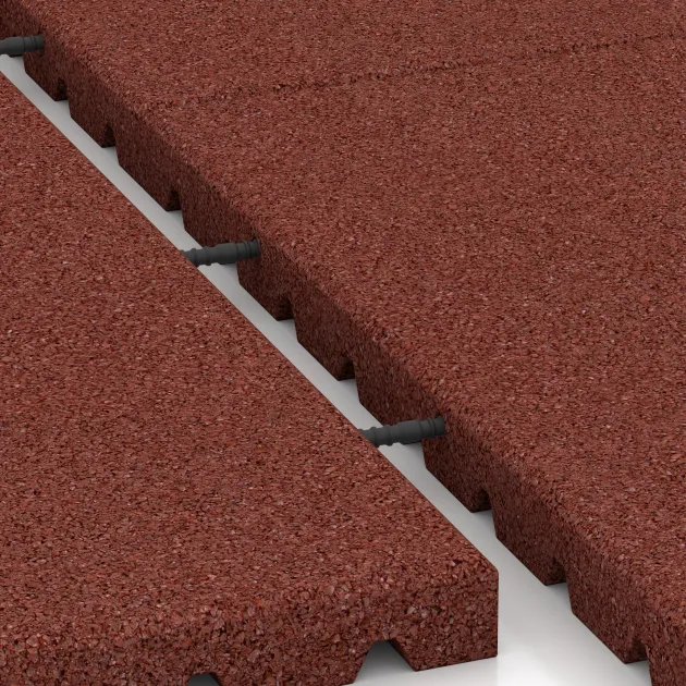 Großaufnahme vom Verbindungssystem von WARCO-Boden 5665 - Płyta gumowa na plac zabaw 4 cm - EN 1177 ≤ 110 cm im Farbdesign Czerwony ceglasty. Abmessungen 1000 x 1000 x 40 mm.