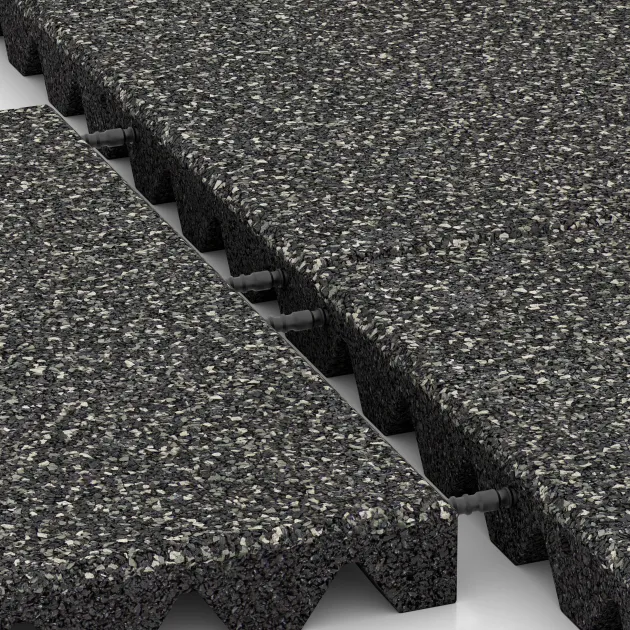 Großaufnahme vom Verbindungssystem von WARCO-Boden 0640 - Płyta gumowa na plac zabaw im Farbdesign Ciemny granit. Abmessungen 500 x 500 x 45 mm.