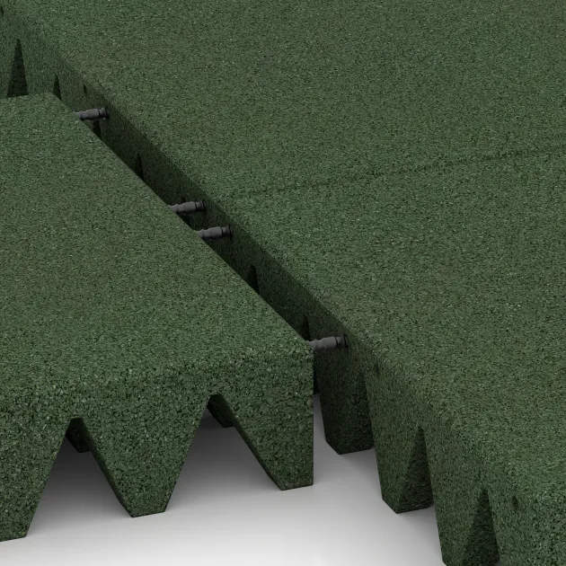 Großaufnahme vom Verbindungssystem von WARCO-Boden 5627 - Mata bezpieczeństwa na plac zabaw 10 cm - EN 1177 ≤ 300 cm im Farbdesign Zielony trawiasty. Abmessungen 500 x 500 x 100 mm.