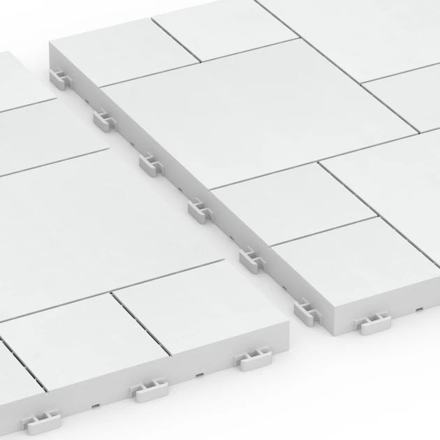 Großaufnahme vom Verbindungssystem von WARCO-Boden 6333 - Wzór blokowy – Płytki tarasowe im Farbdesign Kreda. Abmessungen 38,5 x 38,5 x 2 cm.