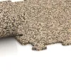 Großaufnahme vom Verbindungssystem von WARCO-Boden 0890 - Nawierzchnia Fitness Kompakt im Farbdesign Trawertyn. Abmessungen 485 x 485 x 8 mm.