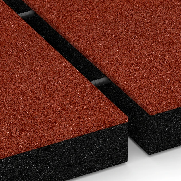 Großaufnahme vom Verbindungssystem von WARCO-Boden 6272 - Płyta amortyzująca – 230 cm im Farbdesign Czerwony ceglasty. Abmessungen 50 x 50 x 8 cm.
