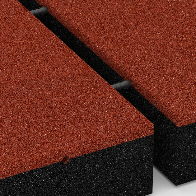 Großaufnahme vom Verbindungssystem von WARCO-Boden 6278 - Płyta amortyzująca – 300 cm im Farbdesign Czerwony ceglasty. Abmessungen 50 x 50 x 11 cm.