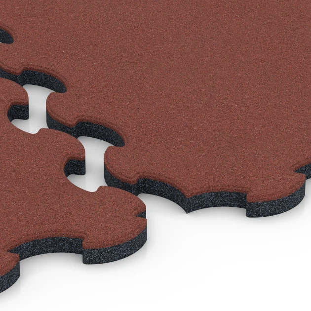 Großaufnahme vom Verbindungssystem von WARCO-Boden 6392 - Stallmatte Puzzle im Farbdesign Czerwony ceglasty. Abmessungen 102,5 x 102,5 x 3 cm | 1,05 m².
